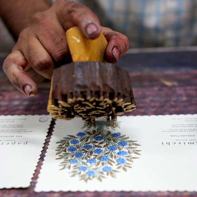 Hand Block Printed Single Card- flowering tree, periwinkle ink with hands showing block printed process final step