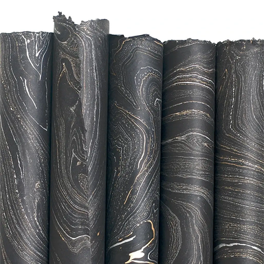 Handmade Marbled Paper- Black with Silver and Gold 5 sheets rolled to show pattern variations
