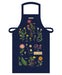 Cavallini & Co. Herbarium Cotton Apron features reproductions of vintage scientific images, complete with scientific names. The detailed images stand out on the dark background. 