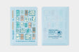 TRAVELER'S notebook 2027 Passport Clear Folder- image shows both front and back of blue-tinted "clear folder" for 2027