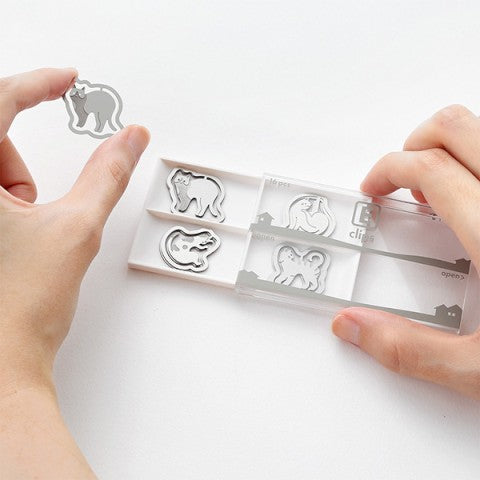 The set contains 4 each of 4 designs, for a total of 16 delicately etched clips. 