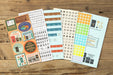 TRAVELER'S notebook 2027 Sticker Collection- all 6 sticker sheets shown together.