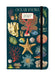 2027 Cavallini & Co. Ocean Fauna Weekly Planner has a dark teal cover decorated with vintage-style illustrations of sea stars, coral, shells, and marine life. A white label on the cover displays '2027'.