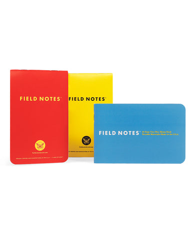 Field Notes 1943 Edition 3-Pack- Three colorful Field Notes notebooks on a white background