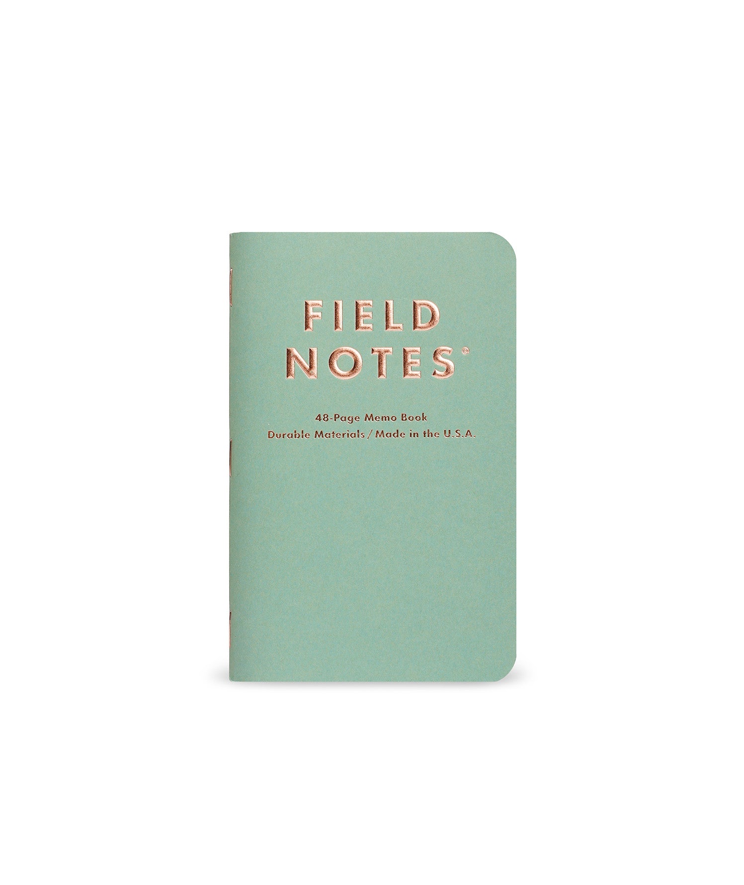 Green notebook with 'Field Notes' branding on a white background