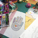 Hand Sampler Embroidery Kit- work in progrss on table with additoonal materials shonw