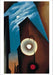 Georgia O’Keeffe: Architecture Boxed Notecard Assortment- card image showing a stylized artwork depicting a moonlit city scene with angular buildings, a glowing street lamp, and a blue sky with clouds.