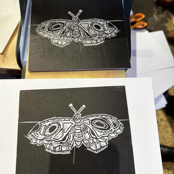 Block Printing – Celebrating Pollinators printed moth class sample and printing plate- student work