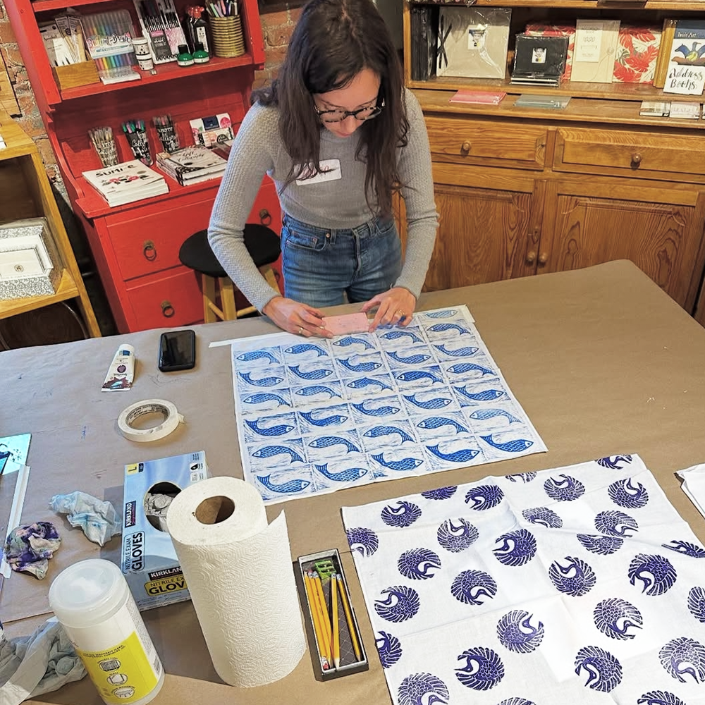 Furoshiki - Printing on Fabric class student with stamping in progress