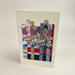 Card with wovewen paper patchwork design on a plain background