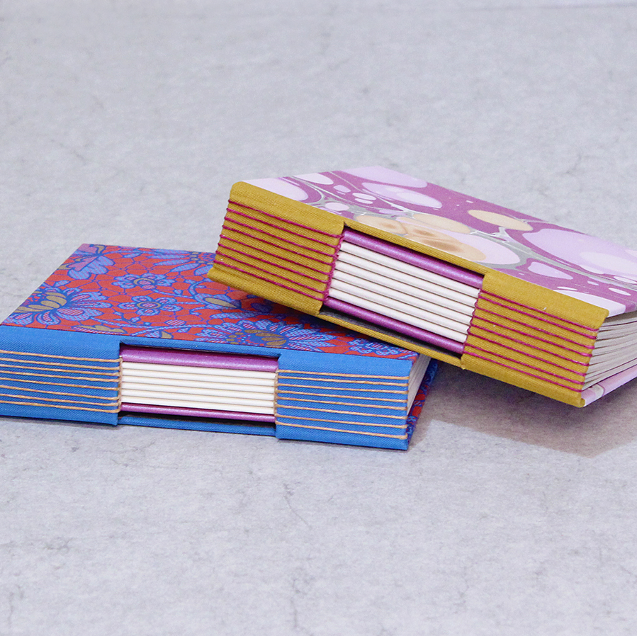 Buttonhole Binding class samples showing spine detail