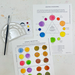 Colorways - Mixing Colors class exercise color wheel with palette and brush and working through mud exercise sheet