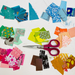 sorting papers ito color piles with scissors
