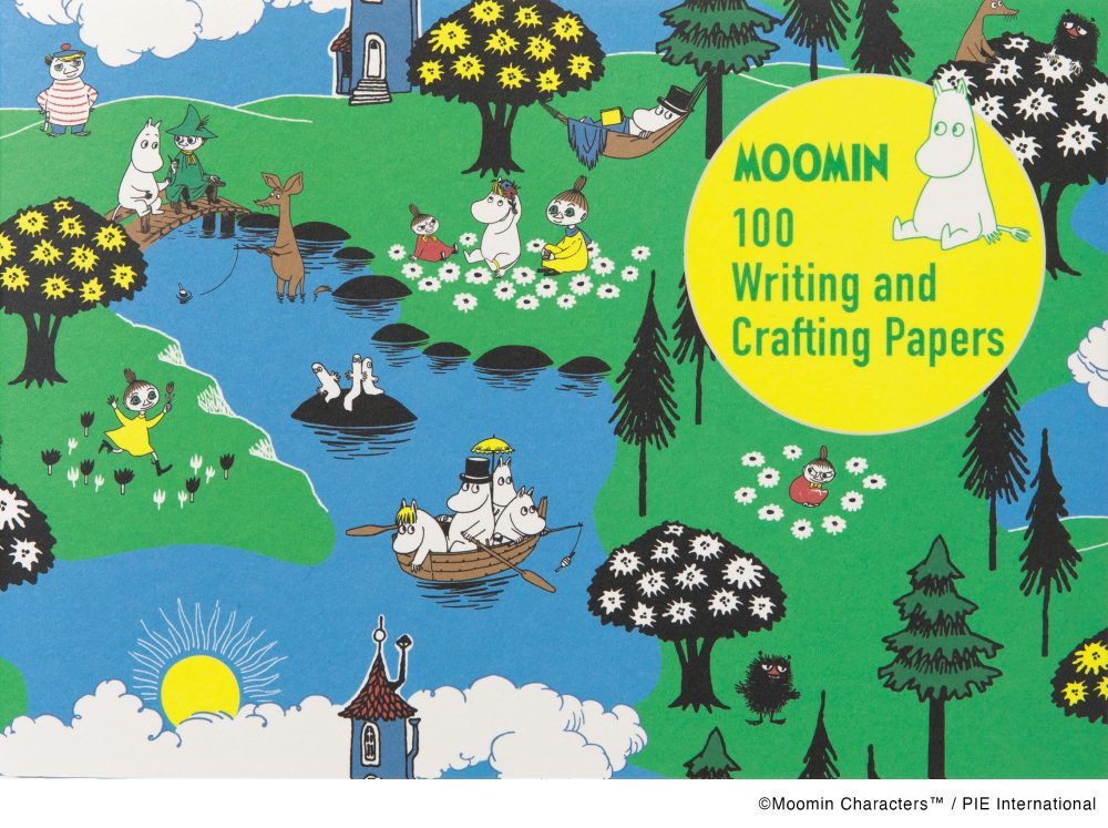 Cover of Moomin writing and crafting papers with cartoon characters and nature scene.