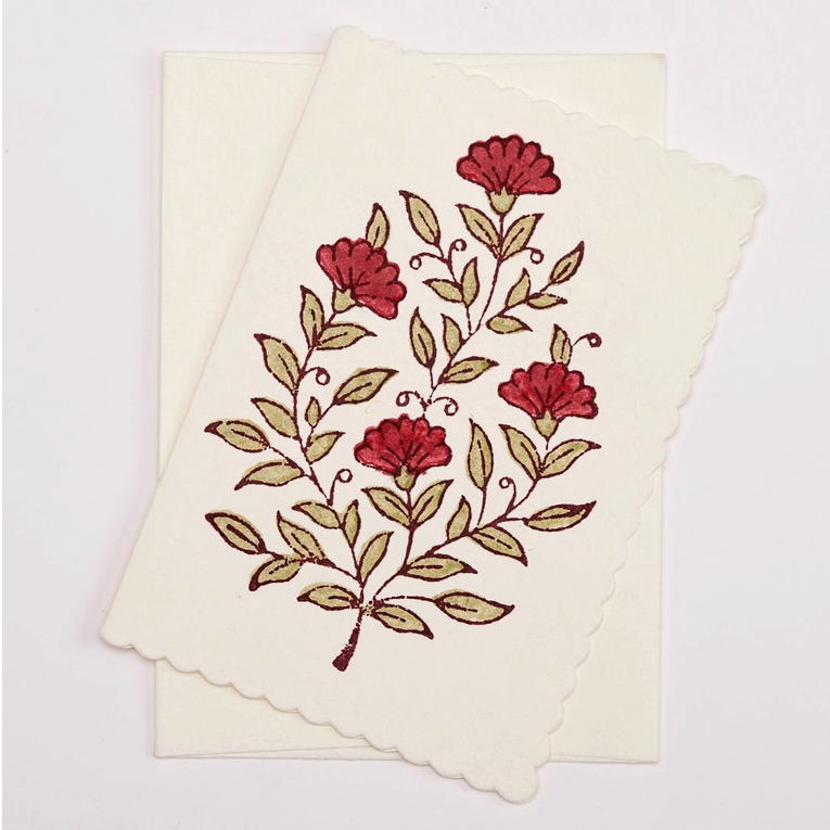 Notecard sample withscarlet and green floral pattern #1  shown with envelope and scalloped edge