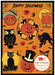 Cavallini & Co. Halloween Puzzle Greeting Card- image showing a completed jigsaw puzzle featuring a Halloween theme with the text 'Happy Halloween' at the top. The design includes orange pumpkins, black cats, red owls, bats, spiderwebs, and a large central pumpkin on an orange background.