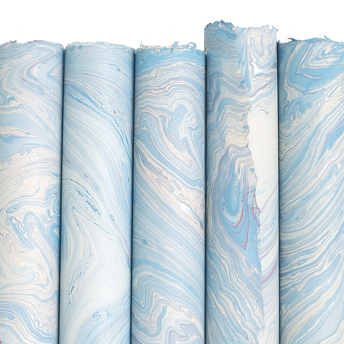 Handmade Marbled Paper- Light Blue with Silver and Red 5 sheets rolled to show pattern variations