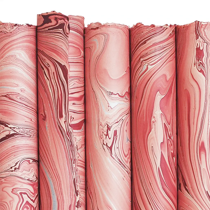 Handmade Marbled Paper- Red, Pink and Silver 5 sheets rolled to show pattern variations