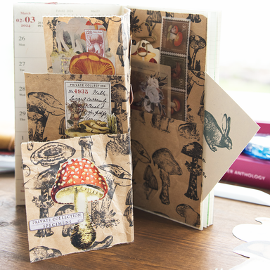 Magic Mushroom Collage + Foldaway Pocketbook Class sample showing layered pages and pocket