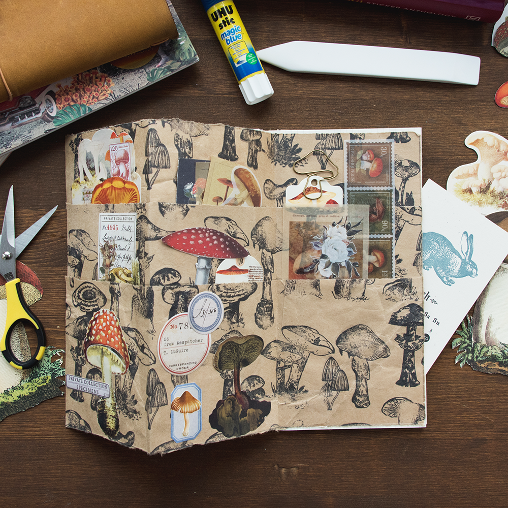 Magic Mushroom Collage + Foldaway Pocketbook Class sample showing layered page pockets with many mushrooms