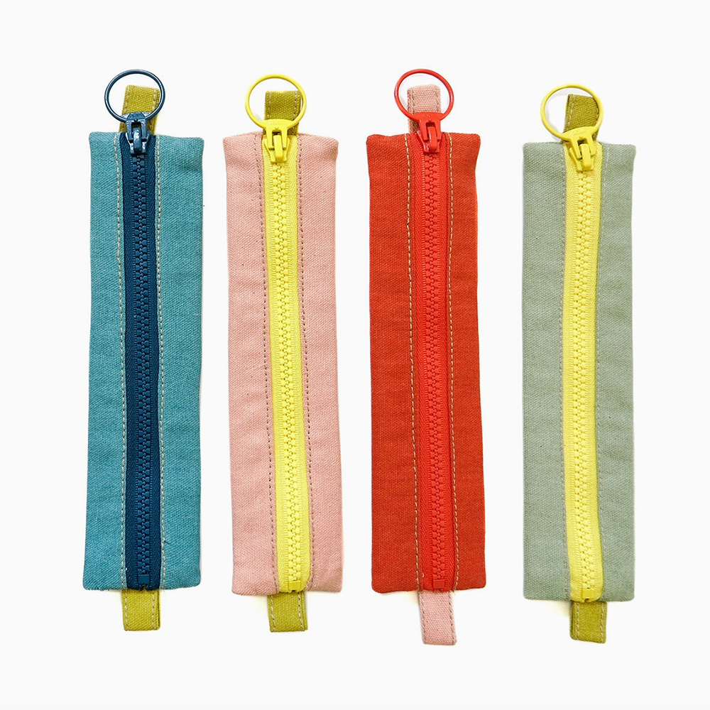 Midcentury Style Zipper Pouch shown in 4  color options