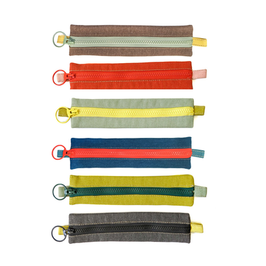 Midcentury Style Zipper Pouch shown in 6  color options
