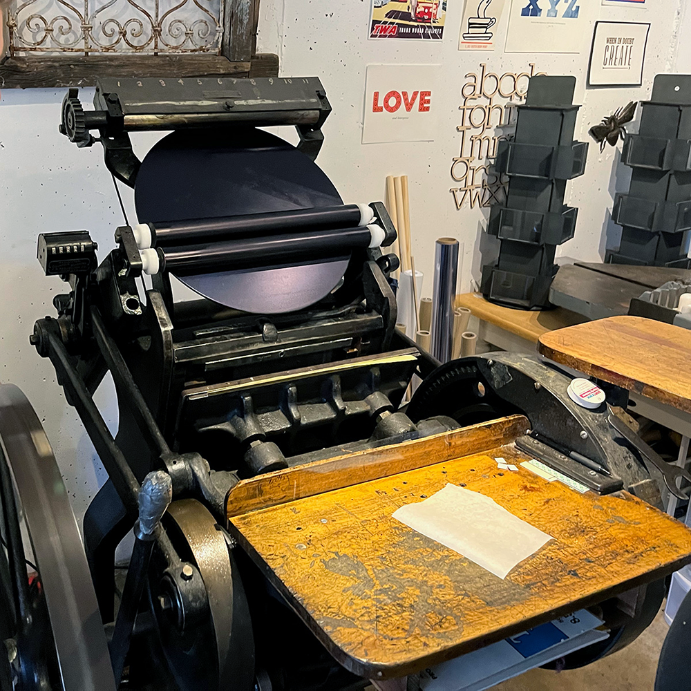 Letterpress machine in the studio with ink