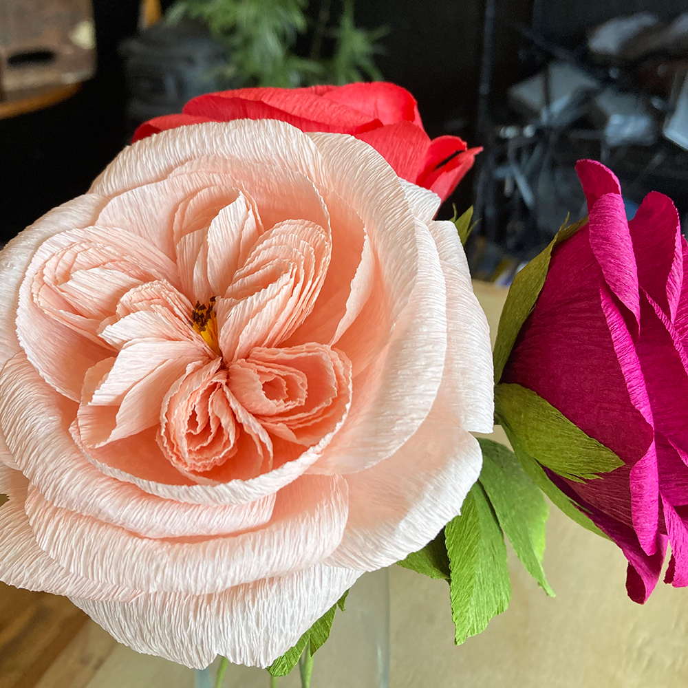 Close-up of a pink paper flower with blurred background