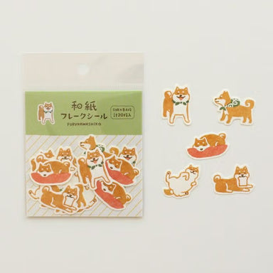 Set of Shiba Inu dog-themed stickers with packaging on a white background, image shows 5 different designs included in the set. 