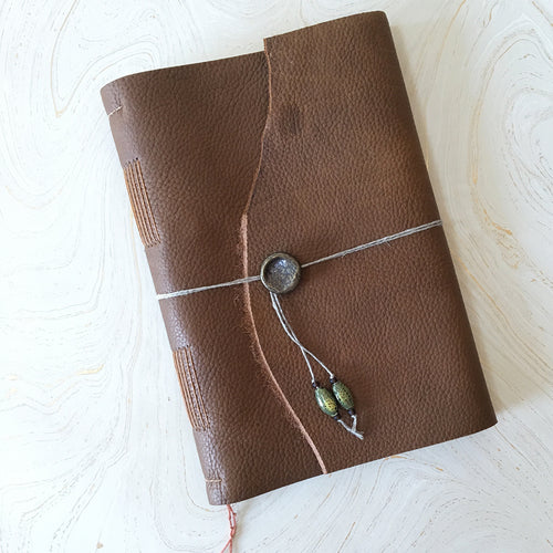 Medieval Leather Journal Class sample- closed with string wrap, button and green beads
