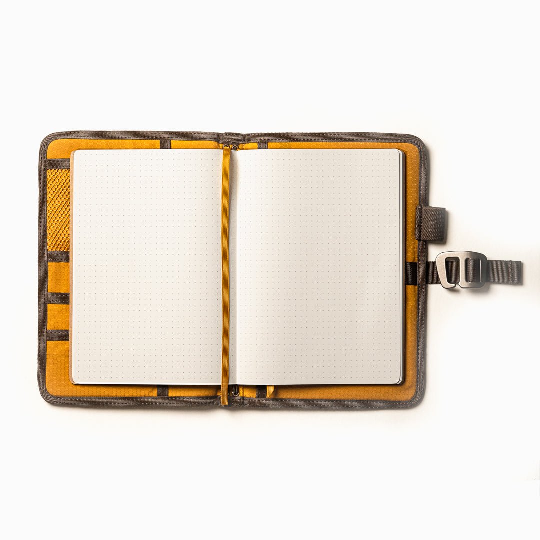 Lochby Field Journal in brown with yellow interior shown open