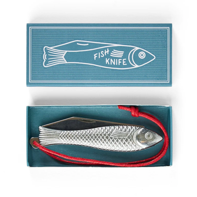Fish-shaped knife with red string in a blue box labeled 'Fish Knife'.