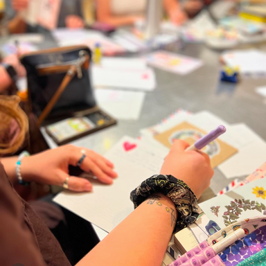 Letter writing night- people writing letters