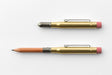 TRAVELER'S COMPANY BRASS PENCILs- one with cap on and one with cap posted on end