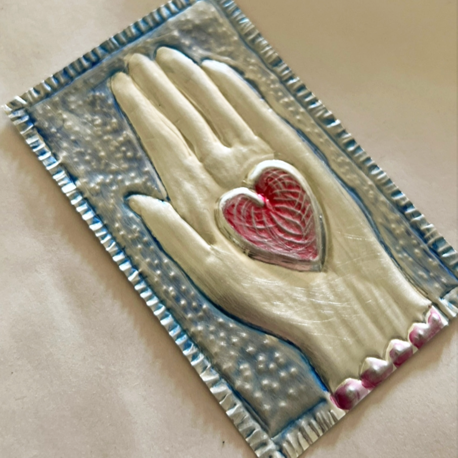 Metal Embossing - Sacred Heart class sample- hand with red heart