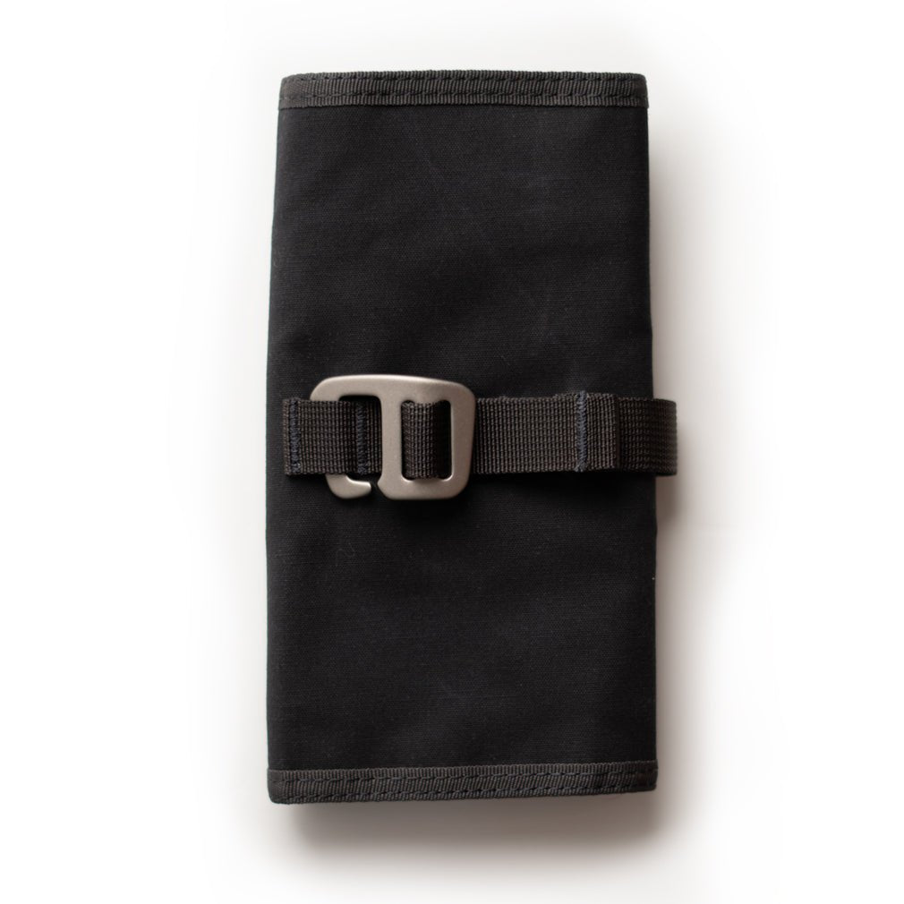 Lochby Tool Roll in black canvas shown closed