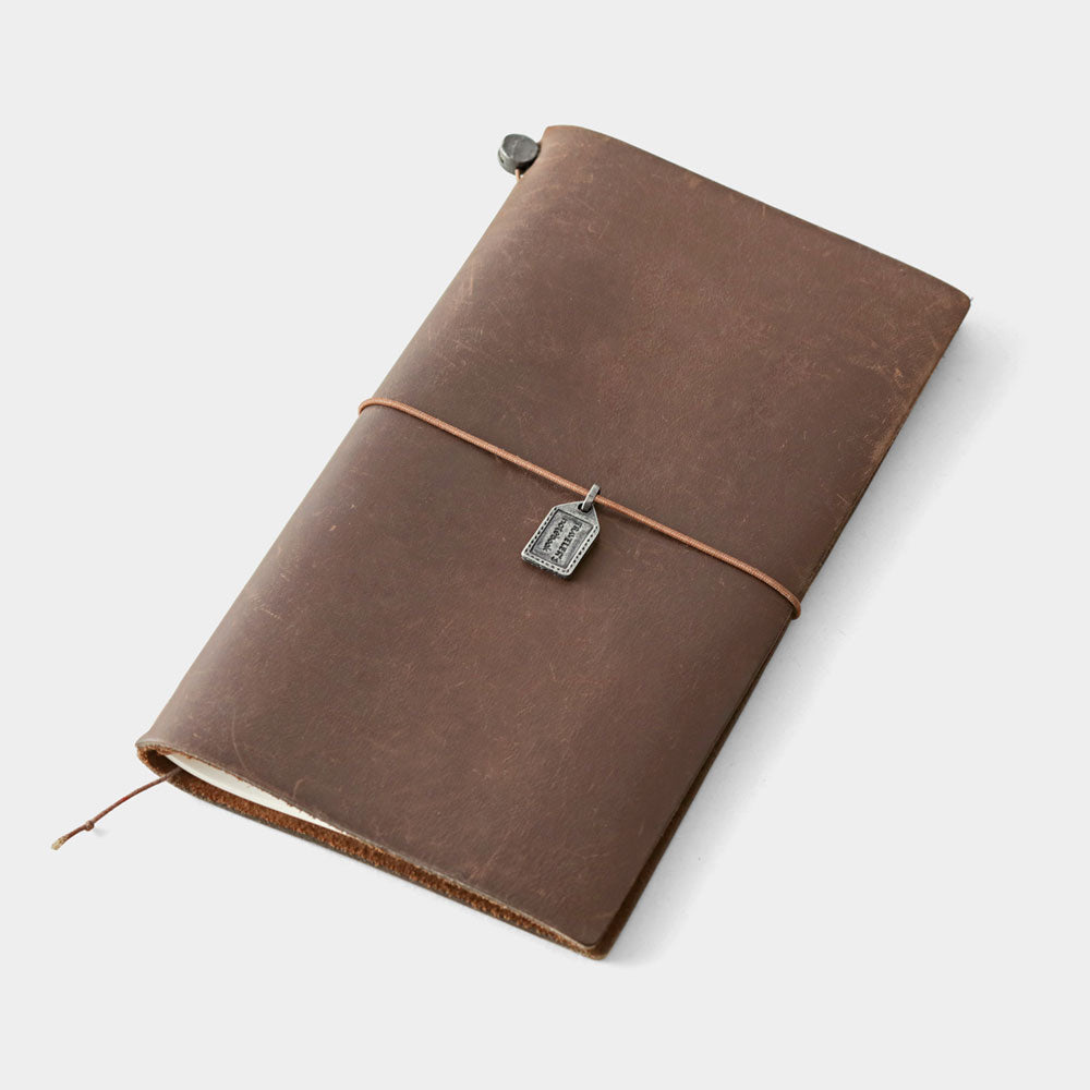 Traveler's Factory Partner Shop Charm- Tag on regular size Traveler's Notebook.