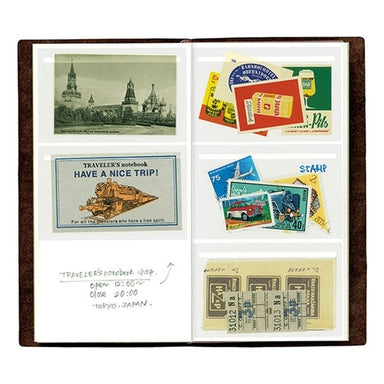 Use the Midori Traveler's Notebook Refill-Accessory- Film Pocket Stickers inside your notebook to hold tickets or small mementos. 