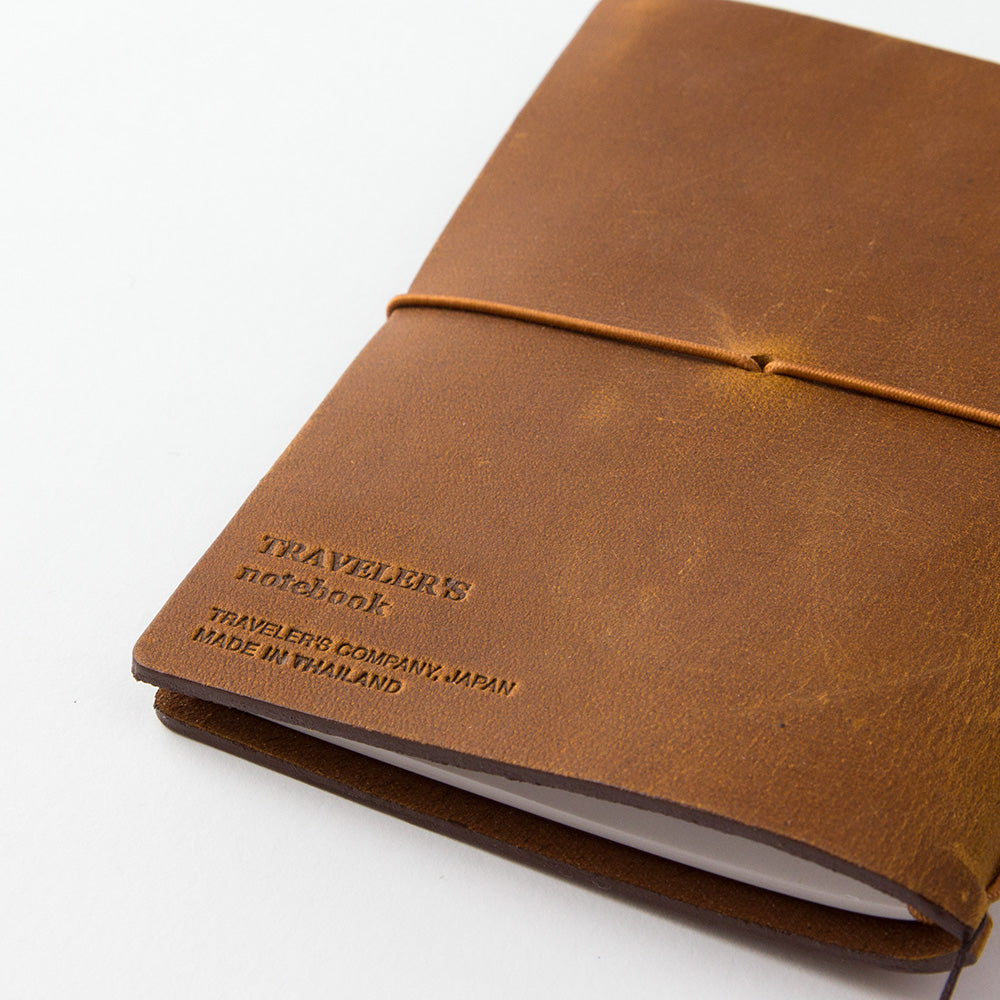 TRAVELER'S notebook Camel colored Passport Size Starter Kit- rich camel colored leather has variation between each notebook, so each one feels even more unique.