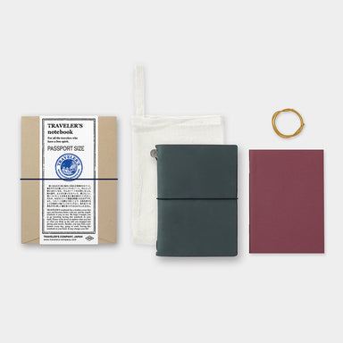 The Blue Starter Kit features a passport sized blue leather cover, a blank MD paper notebook refill, a spare rubber band, and a cotton case. 