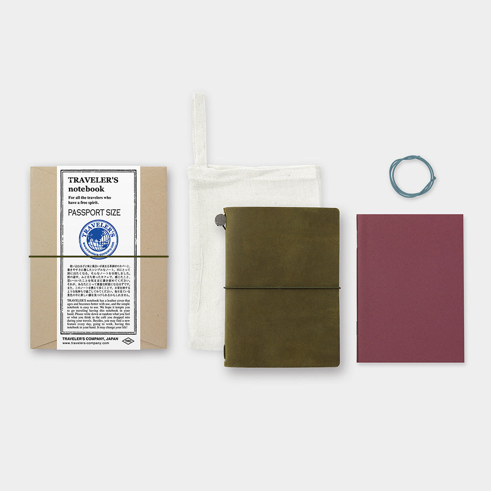 The TRAVELER'S notebook line is one of our favorite things at Two Hands Paperie. The new Olive Starter Kit features a passport sized olive leather cover, a blank MD paper notebook refill, a spare rubber band, and a cotton case.