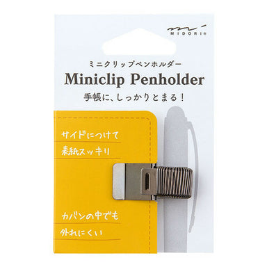 Midori Miniclip Pen Holder in Black hold most any pen or pencil.