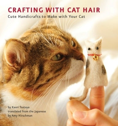 Crafting With Cat Hair by Kaori Tsutaya book cover with cat sniffing a cat finger puppet