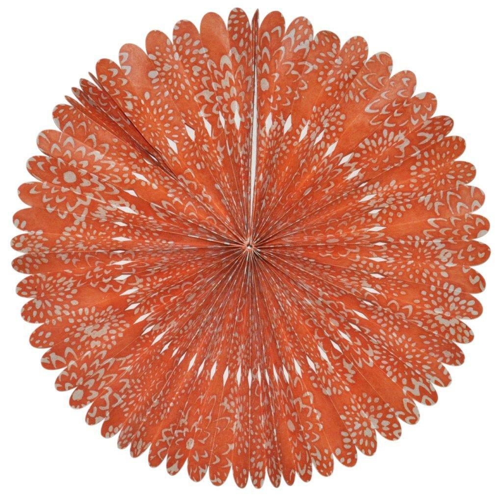 The Orange Mum Rosette features handmade Lokta paper that is shaped into a rosette by a women's cooperative in Nepal. 