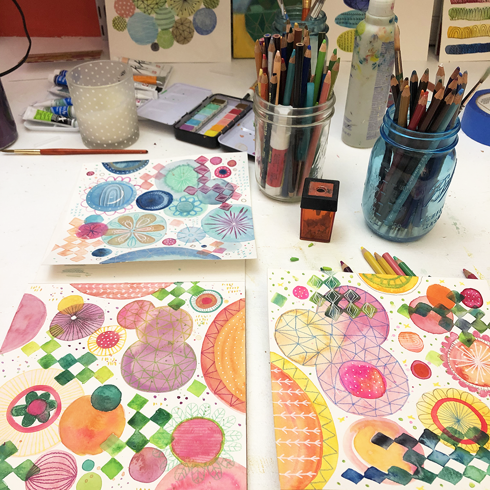 Watercolor – Exploring Colors and Shapes Online Class samples with materials on the artist's workspace.