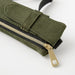 Pouch has a flap-closure storage slot for your onw special pen, and a zipper pouch alongside for one or two others.