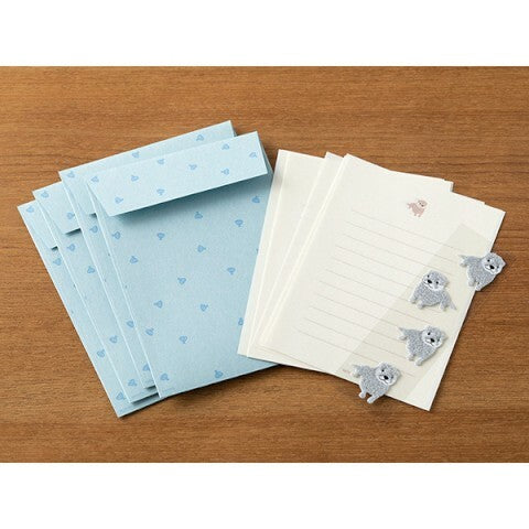 Each set has 4 vertically aligned sheets of paper measuring approximately 4 by 5 1/2 inches, along with four envelopes. Letter sets come packaged in a resealable plastic sleeve. 