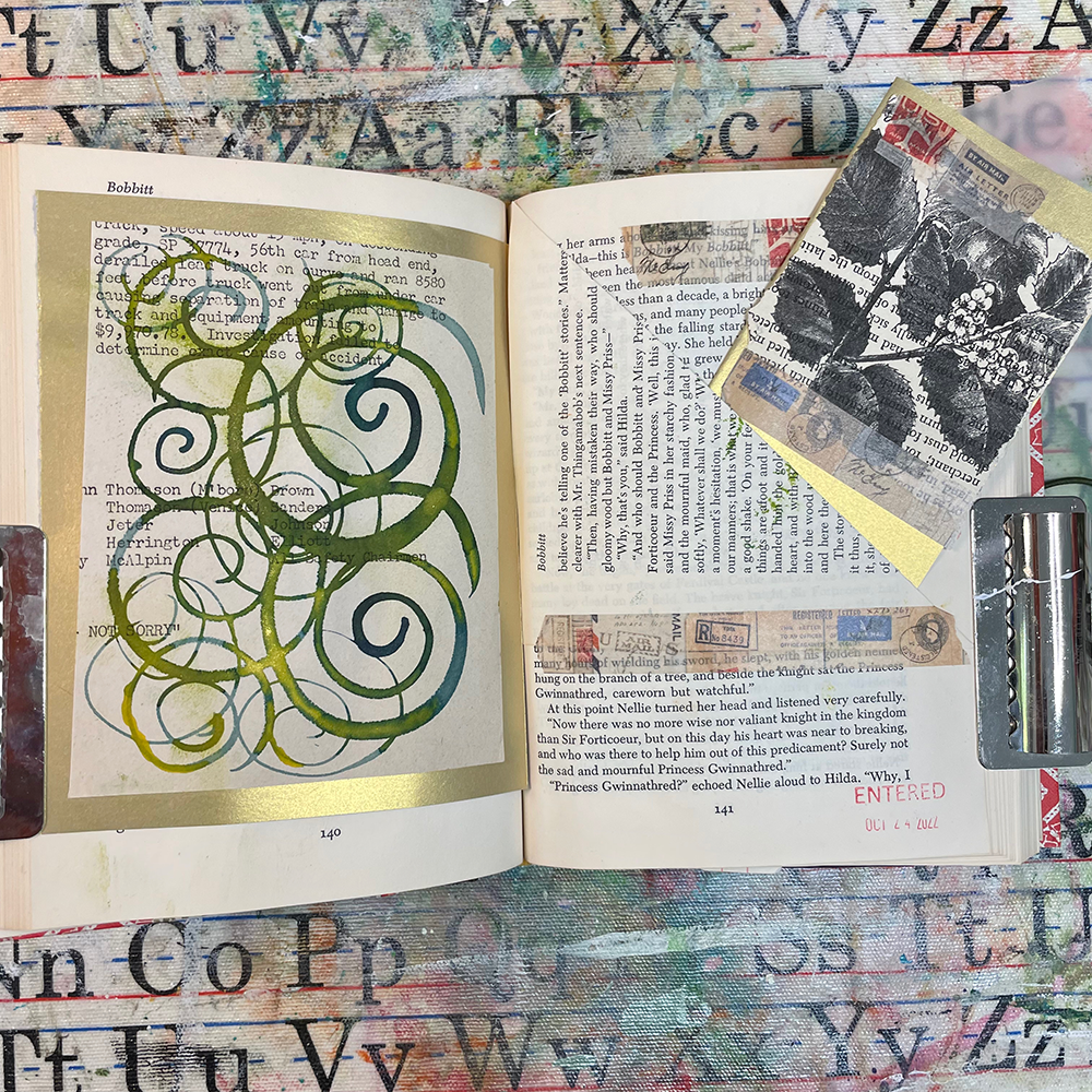 Altered Book - Art of the Word class sample with spiral paitings, collage, washi tape, and secret pocket