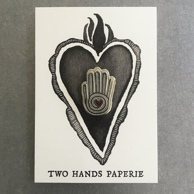 Mano Y corazon (hand and heart) pin mounted onto flaming heart card