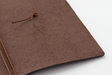 The Regular Size Brown Midori Traveler's Notebook comes with high quality leather that will age as you use it. 